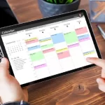 Employee and training with manager talking to person in workplace for learning or support