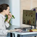 woman looking at Employee Leave Management System HRMS Software